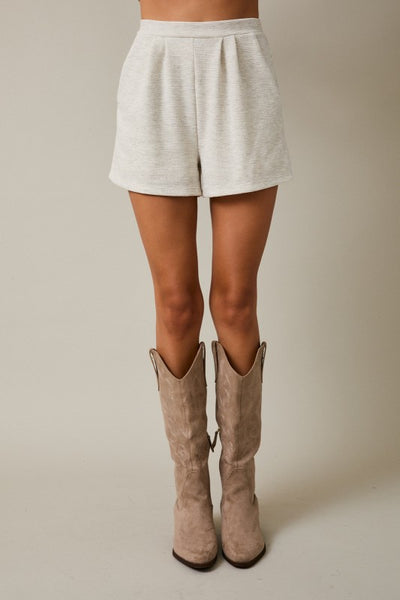 Melania’s Pleated Shorts