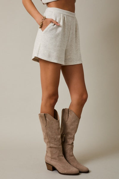 Melania’s Pleated Shorts